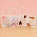 Mini Translucent PVC Printed Gift Bag with Pipe Handle – Decorative Return Gift Packaging Bag - Small (Mix designs)
